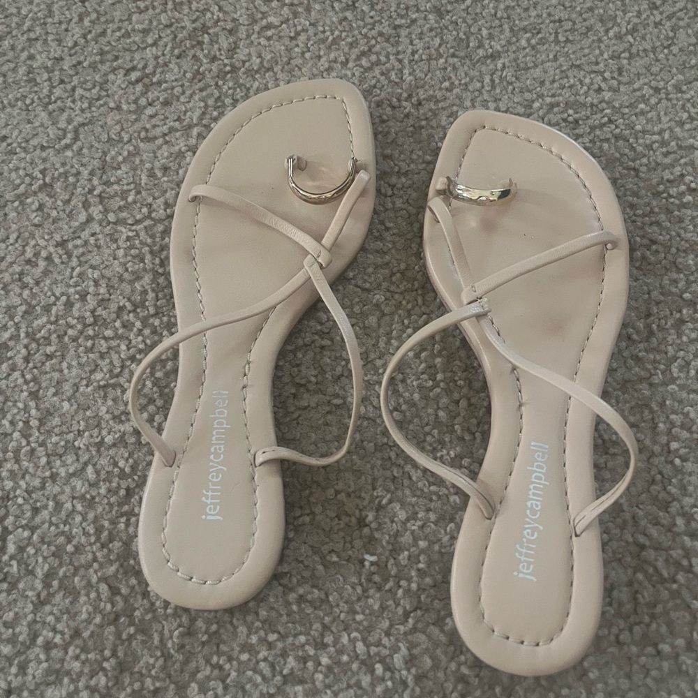 Two Jeffrey Campbell sandals. Tan, slightly used. Silver, brand new.